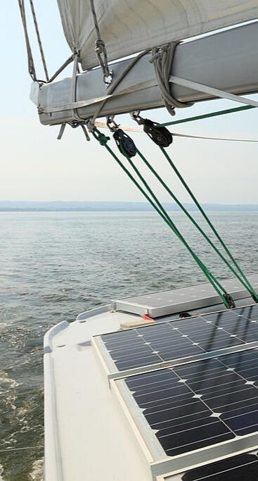 Custom RV electrical system installation with lithium battery bank, inverter, solar charging and DC electrical equipment